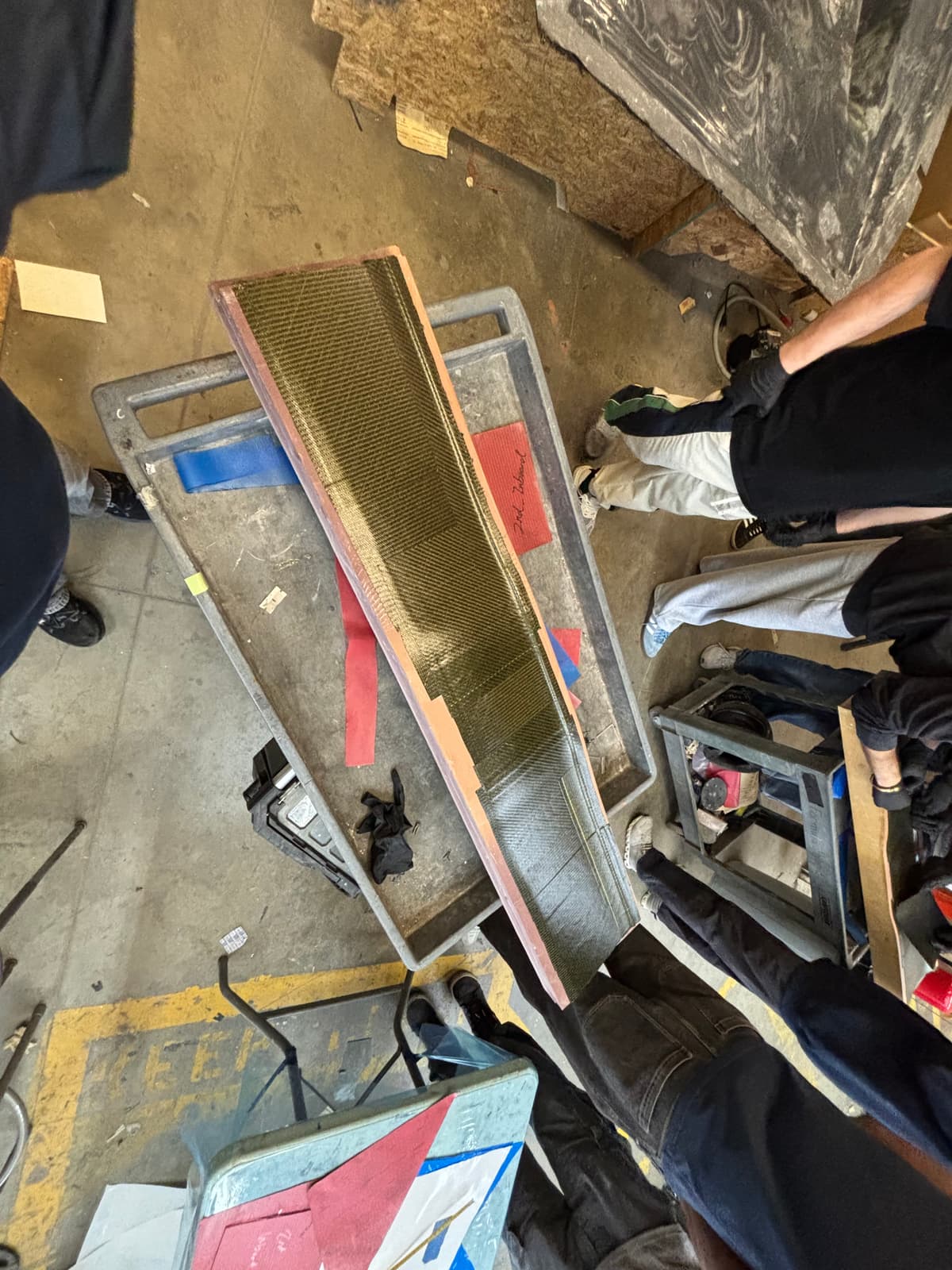 Failed prepreg layup — bridging defect at the leading edge padup