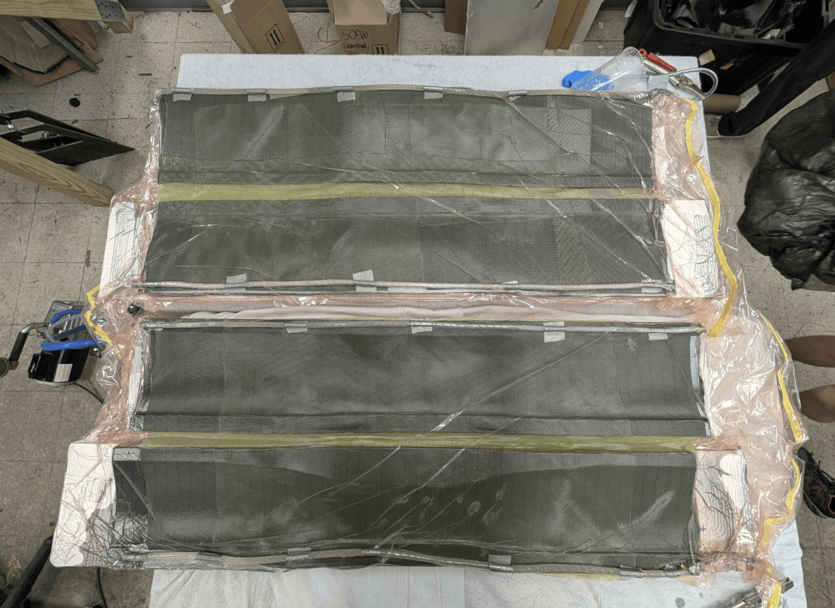 Top-down view of the front wing resin infusion setup